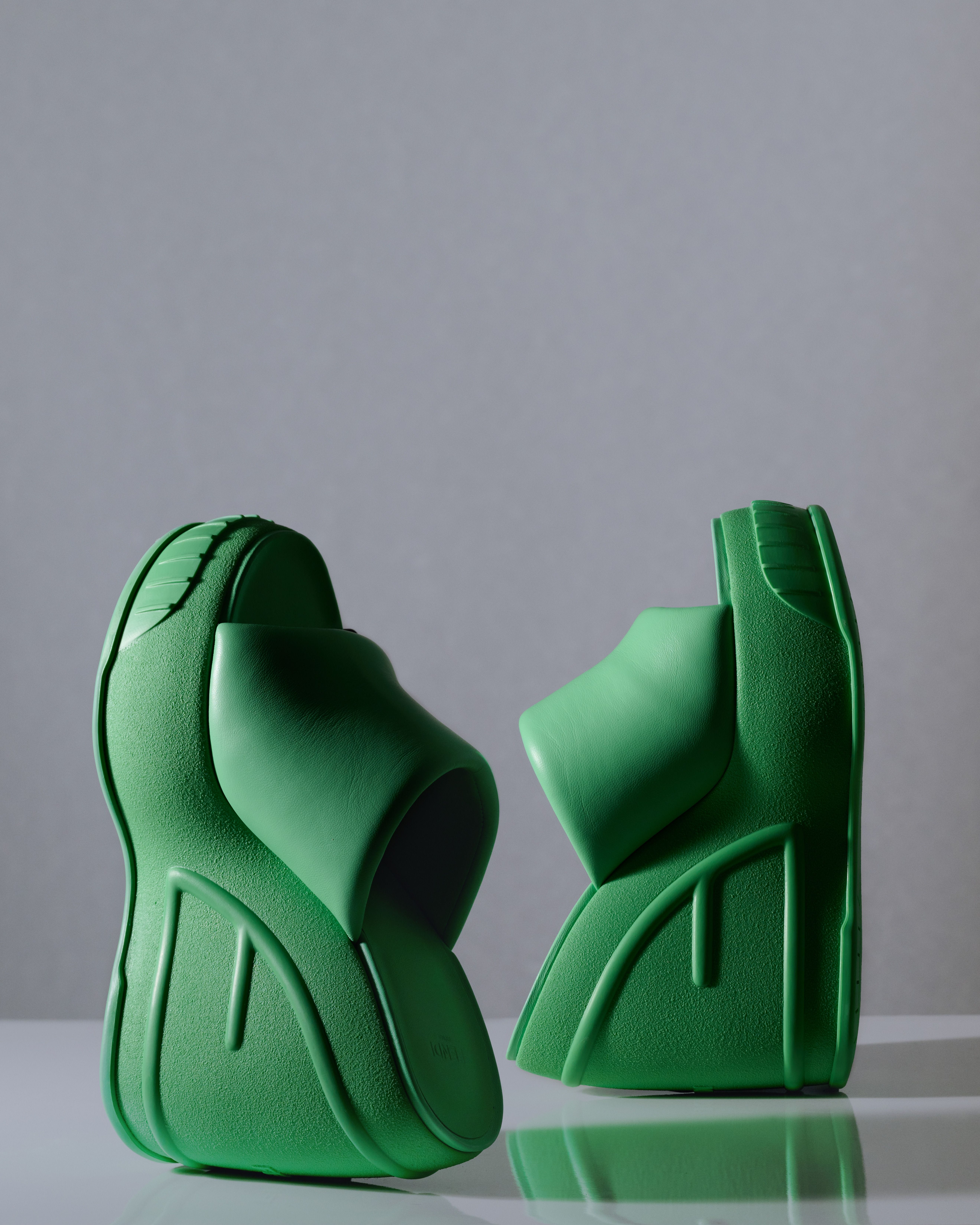Fendi rubber and leather platform slides, a trending luxury item