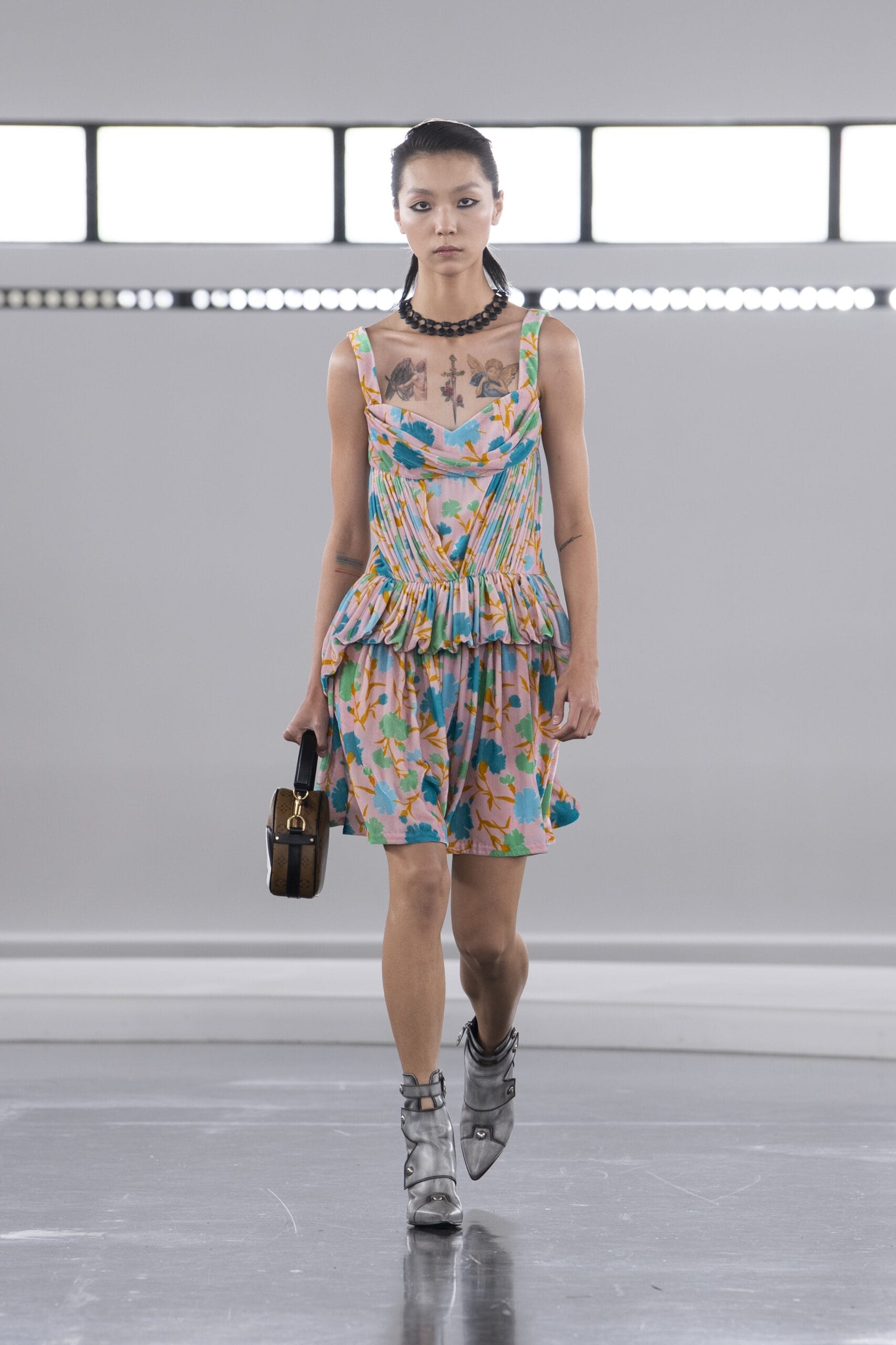 Guided by the spirit of travel, Nicolas Ghesquière presents the maison's Pre-Fall 2024 collection in Shanghai at Long Museum 