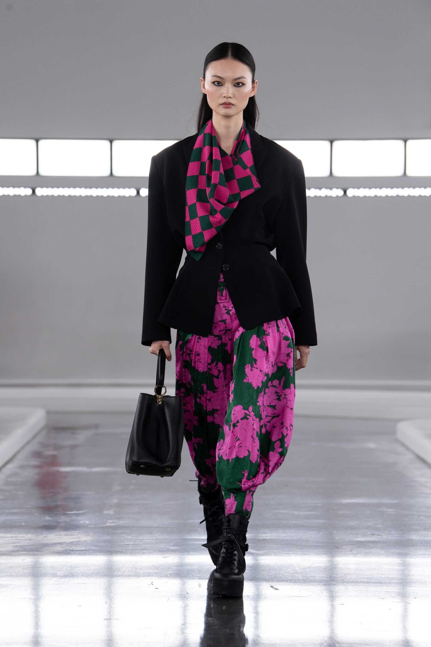 Guided by the spirit of travel, Nicolas Ghesquière presents the maison's Pre-Fall 2024 collection in Shanghai at Long Museum 