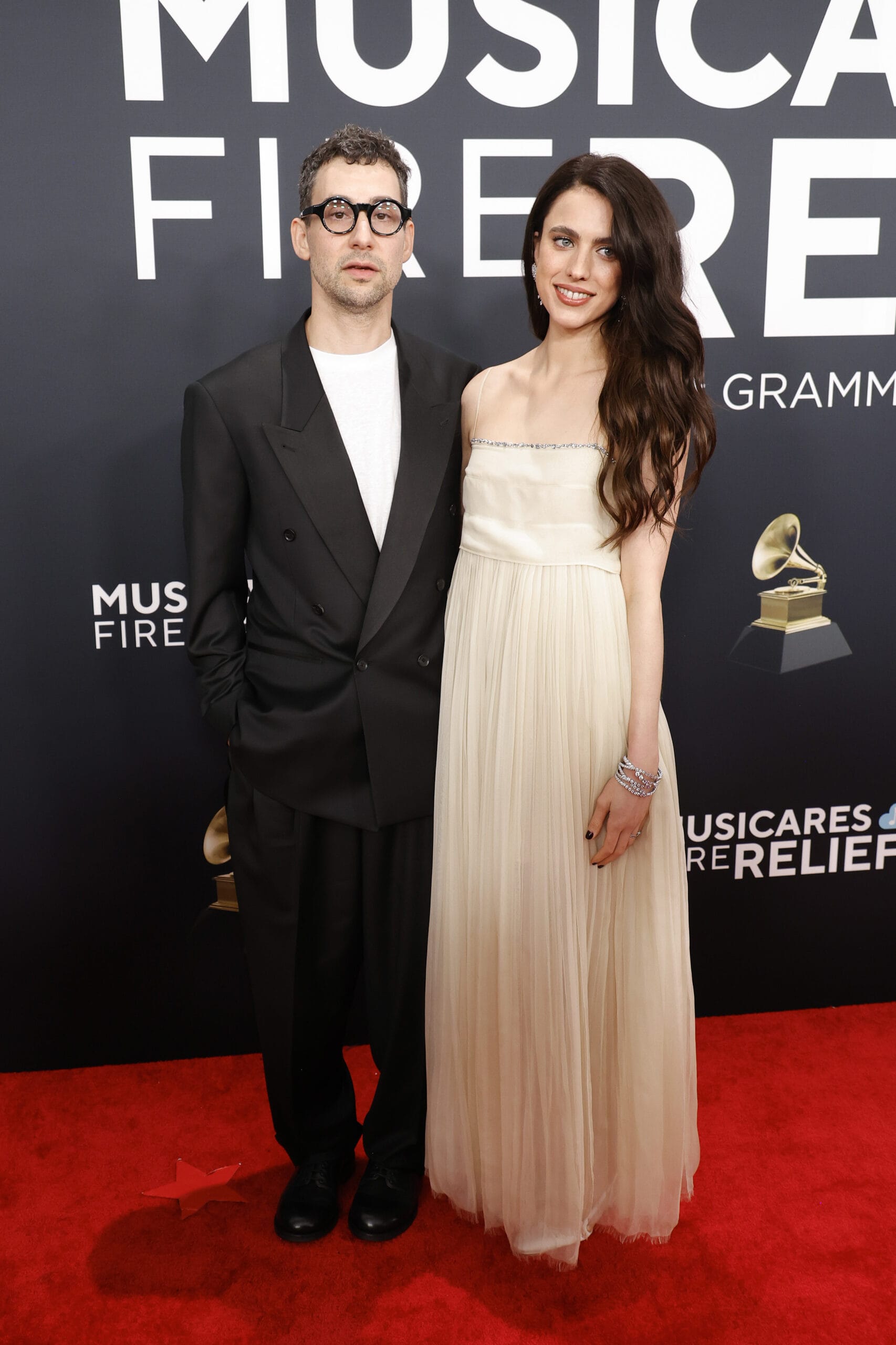 Jack Antonoff and Margaret Qualley fashion moment while attending the 67th GRAMMY Awards on February 02, 2025 in Los Angeles, California. (Photo by Frazer Harrison/Getty Images)